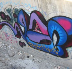 Graffiti on Tehran canal walls (2)