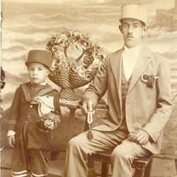 Pahlavi hat, new dress code, and "Giveh" (traditional footwear), probably 1927.