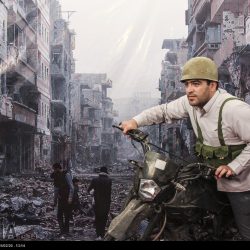 مدافعان حرم در مقابل ویرانه های سوریه